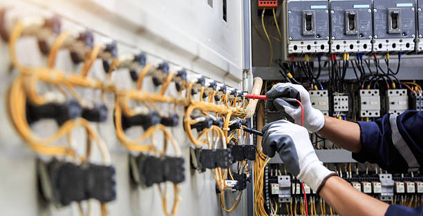 Professional Electrician technician working in Experiment, GA